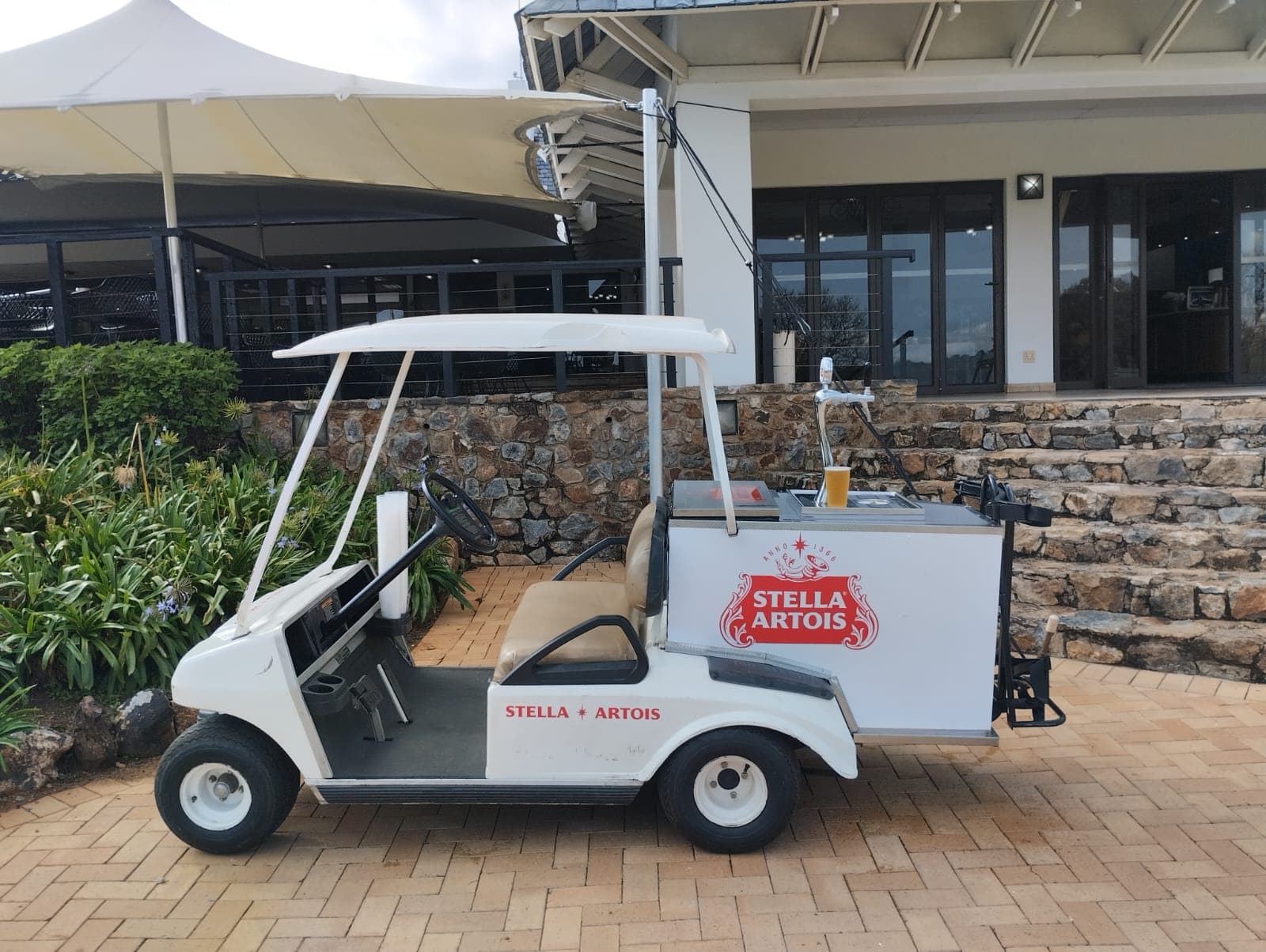 Golf cart converted into a rolling draught bar